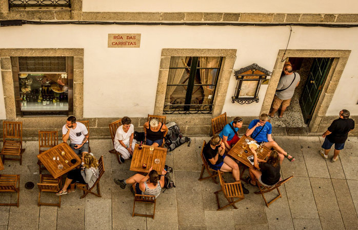 Pilgrims taking a well-deserved break after walking the Camino de Santiago