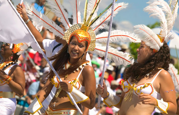 Feathers and glitter acquired, follow the Caribana Festival Parade