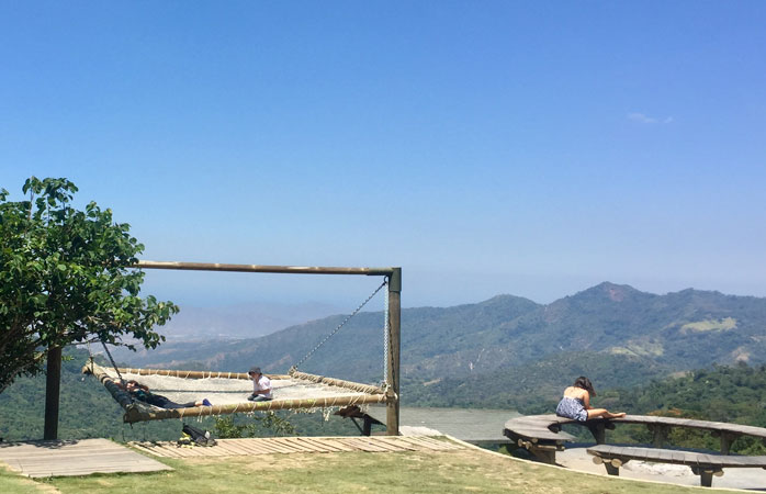 Slow down at Casa Elemento hostel, which has one of the world's largest hammocks with a view of the mountains